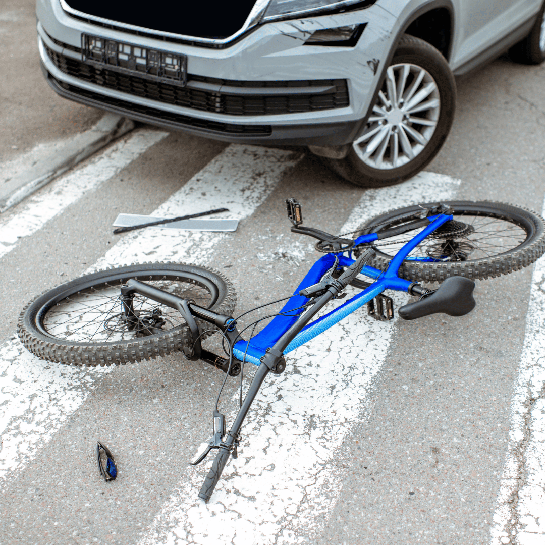 Bicycle hit by car in crosswalk