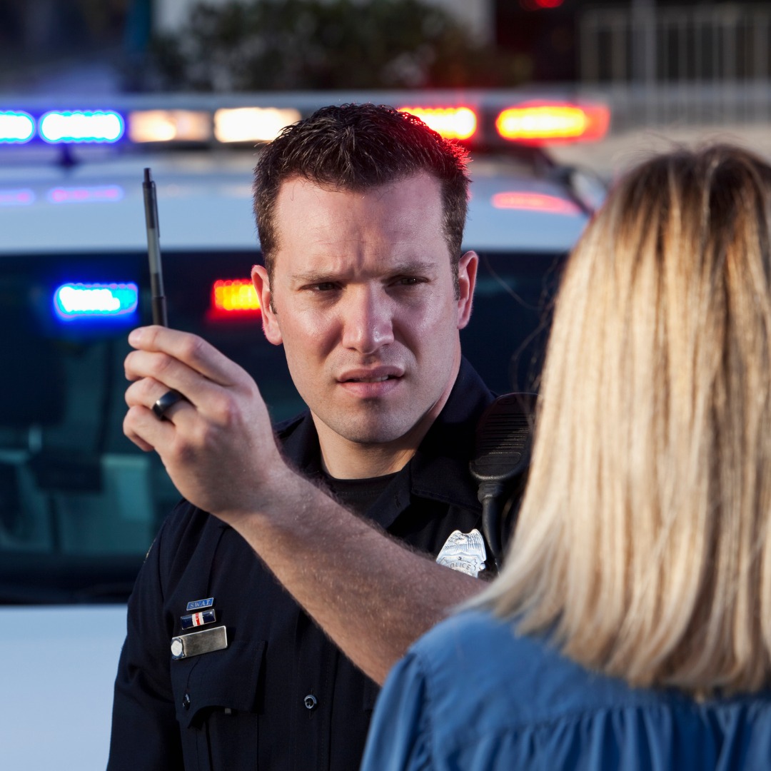 Police Officer Giving Field Sobriety Test