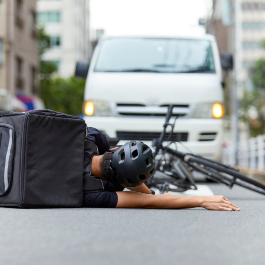Bicyclist injured Crossing the Road Hit by Car